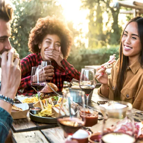 A group of friends having a dinner
