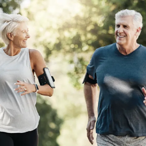 Two people running in the park